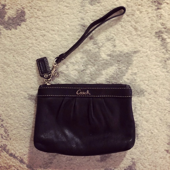 Coach Handbags - Classic black leather Coach wristlet purse